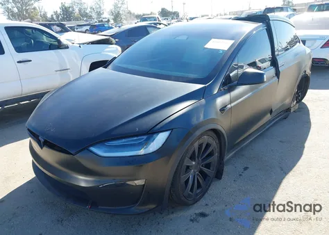 2023 Tesla Model X Dual Motor All-Wheel Drive/Standard Range z USA, uszkodzony, nr VIN 7SAXCAE52PF377914